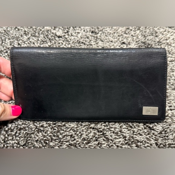 Gucci Handbags - Gucci black leather bifold wallet